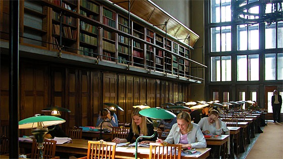 young women reading in Jose Plecnik's National and University Library in Ljubljana, Slovenia